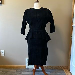 Black suede, leather, three-quarter sleeve dress with open back